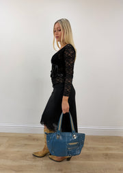 blue shoulder tote bag with silver hardware detail view