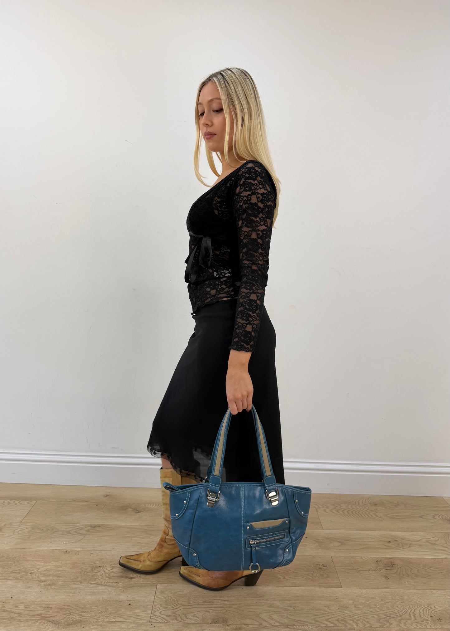 blue shoulder tote bag with silver hardware detail view
