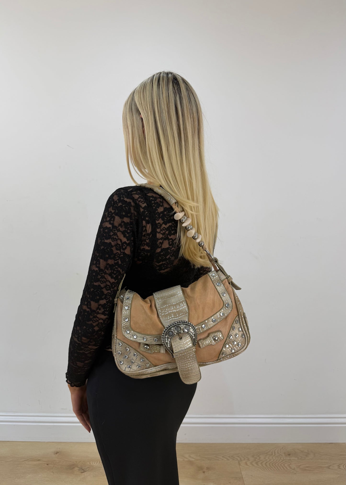 tan embellished shoulder bag with rhinestone buckle detail view