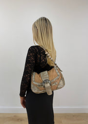 tan embellished shoulder bag with rhinestone buckle detail view