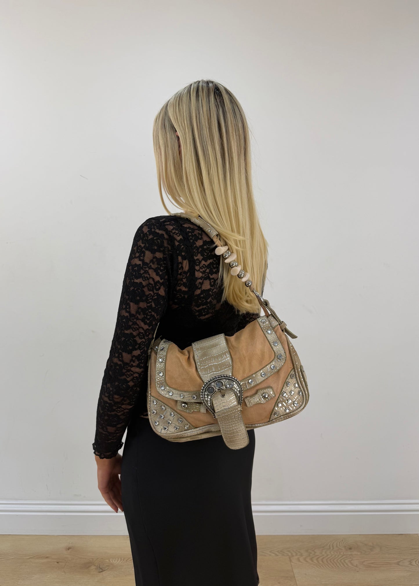 tan embellished shoulder bag with rhinestone buckle detail view
