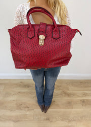 red structured shoulder bag with gold ring hardware front view
