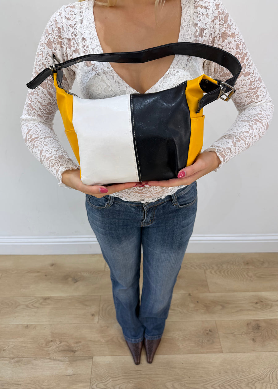 black white and yellow colour block shoulder bag front view