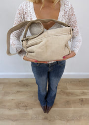 white structured shoulder bag with metallic details detail view