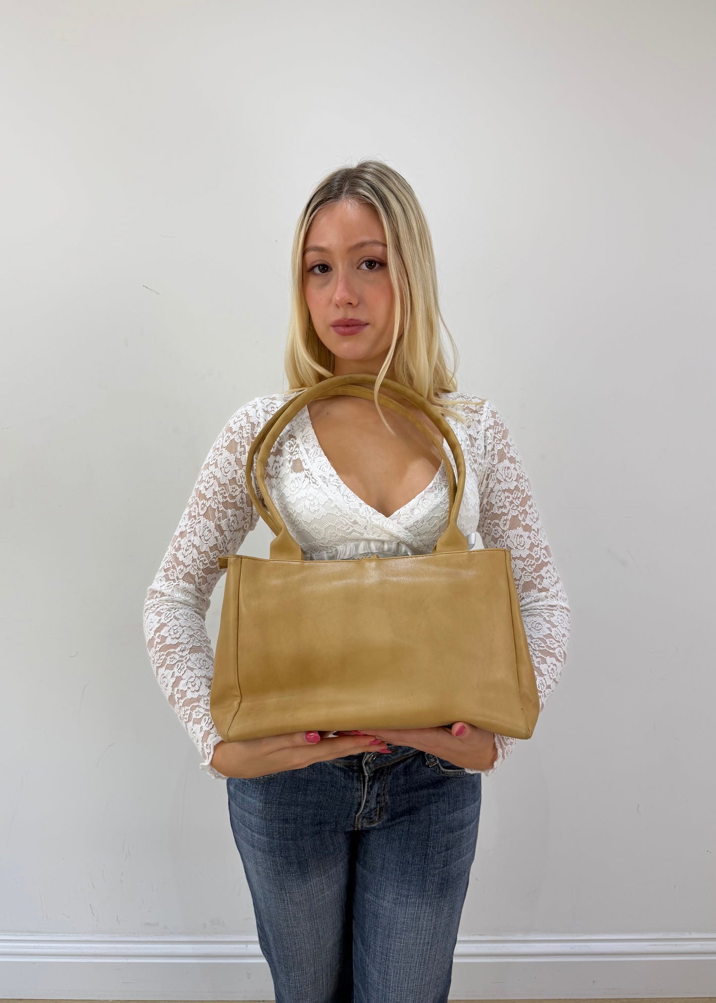 mustard yellow shoulder bag detail view