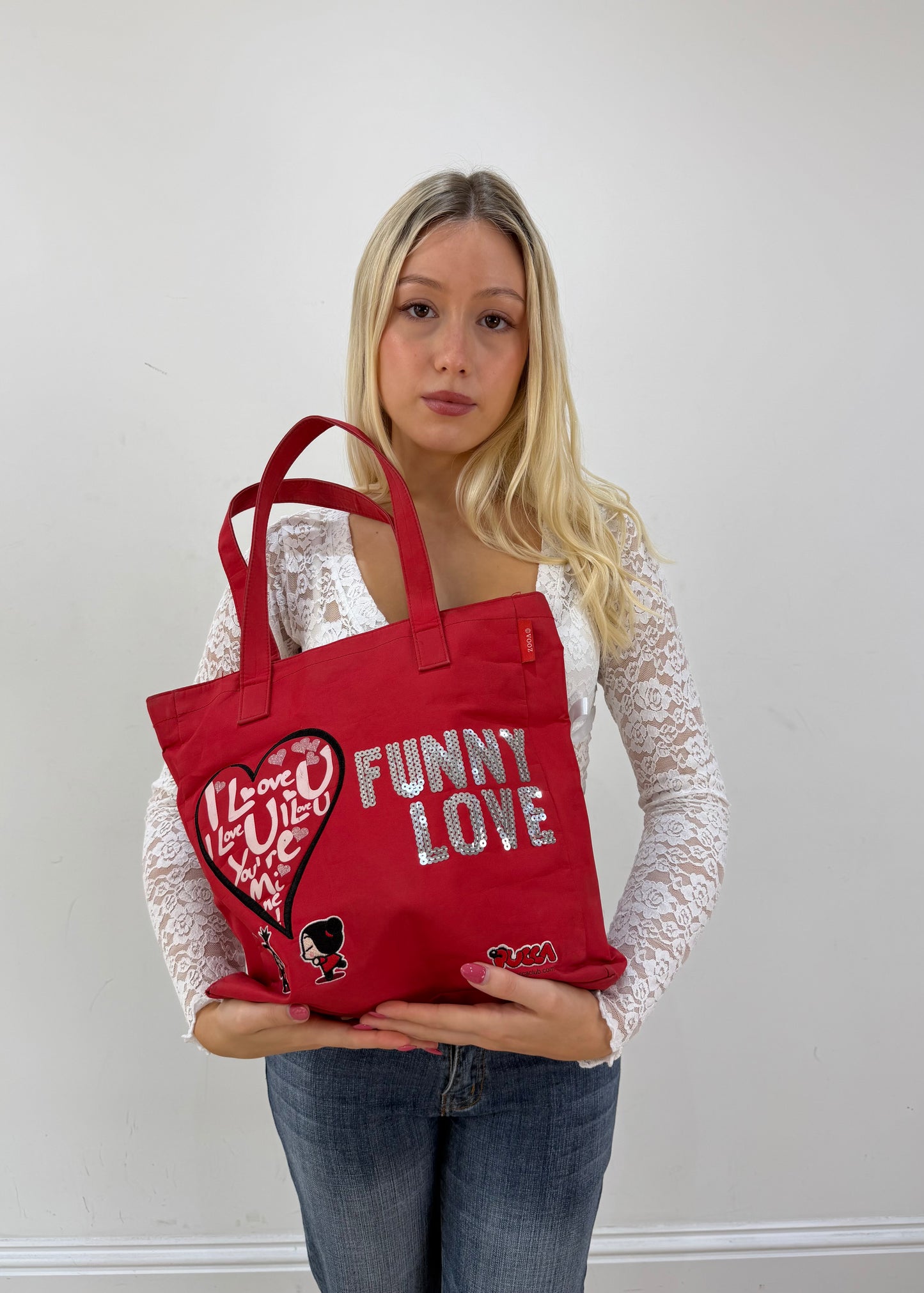 red graphic slogan tote bag detail view