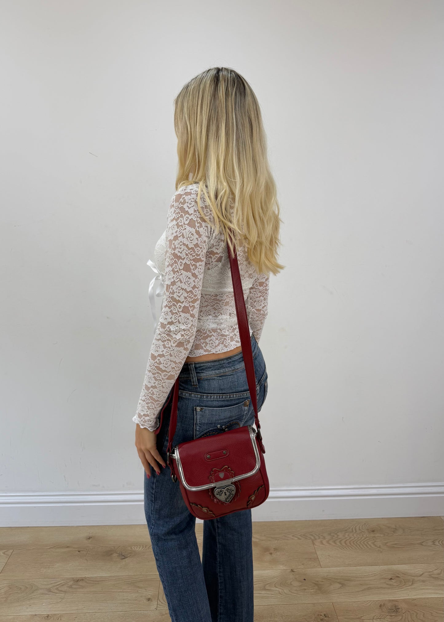 burgundy rounded mini handbag detail view