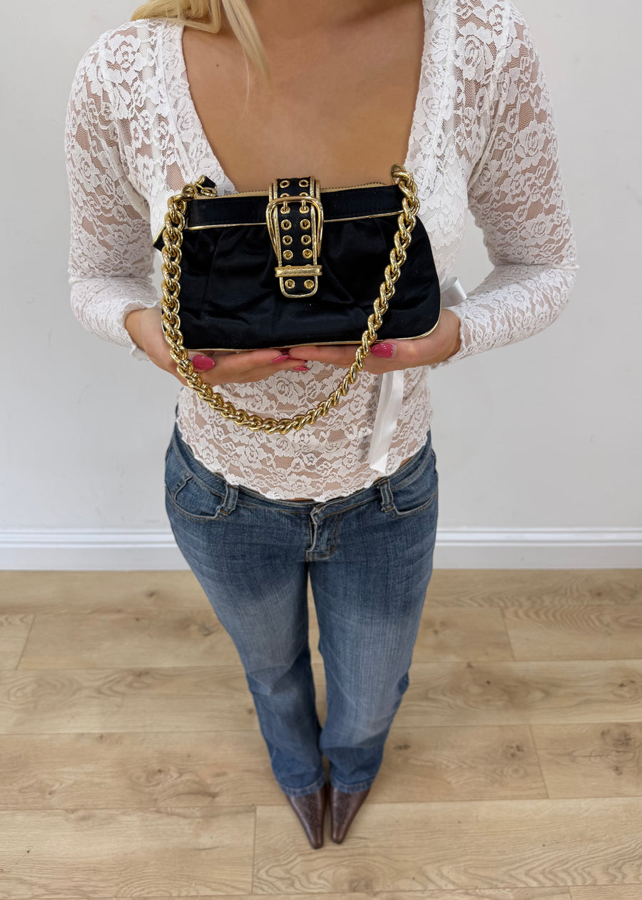 black mini bag with gold buckle front view
