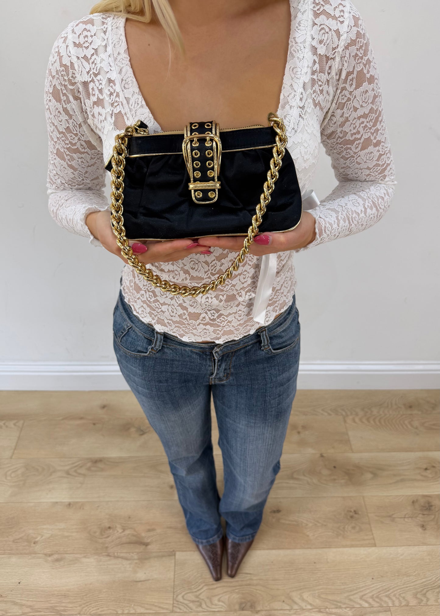 black mini bag with gold buckle front view