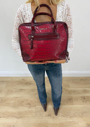 red structured satchel bag front view