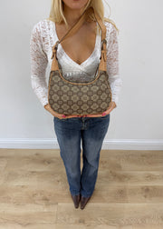 beige and brown patterned shoulder bag front view