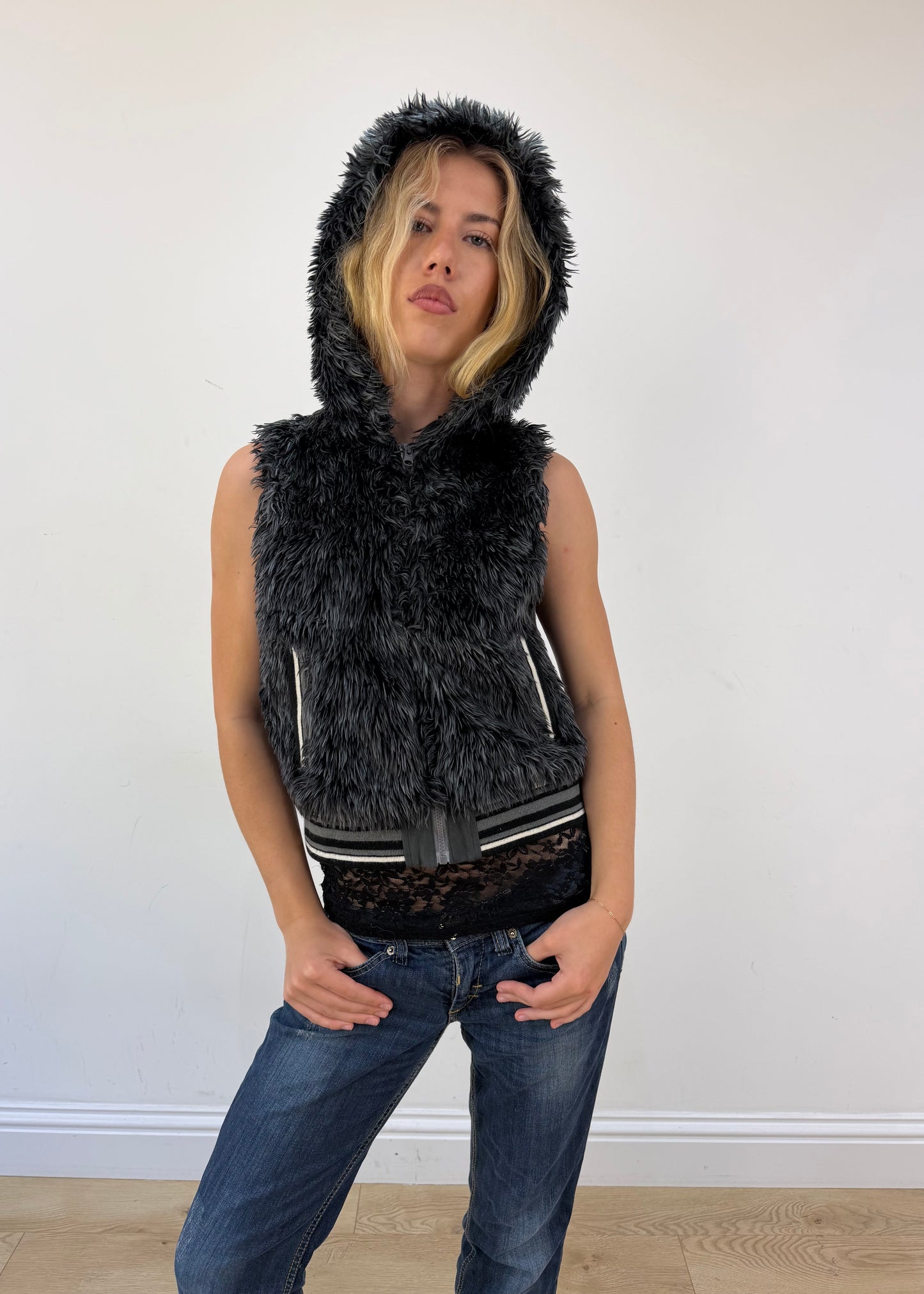 small grey faux fur zip gilet with hood - face close-up