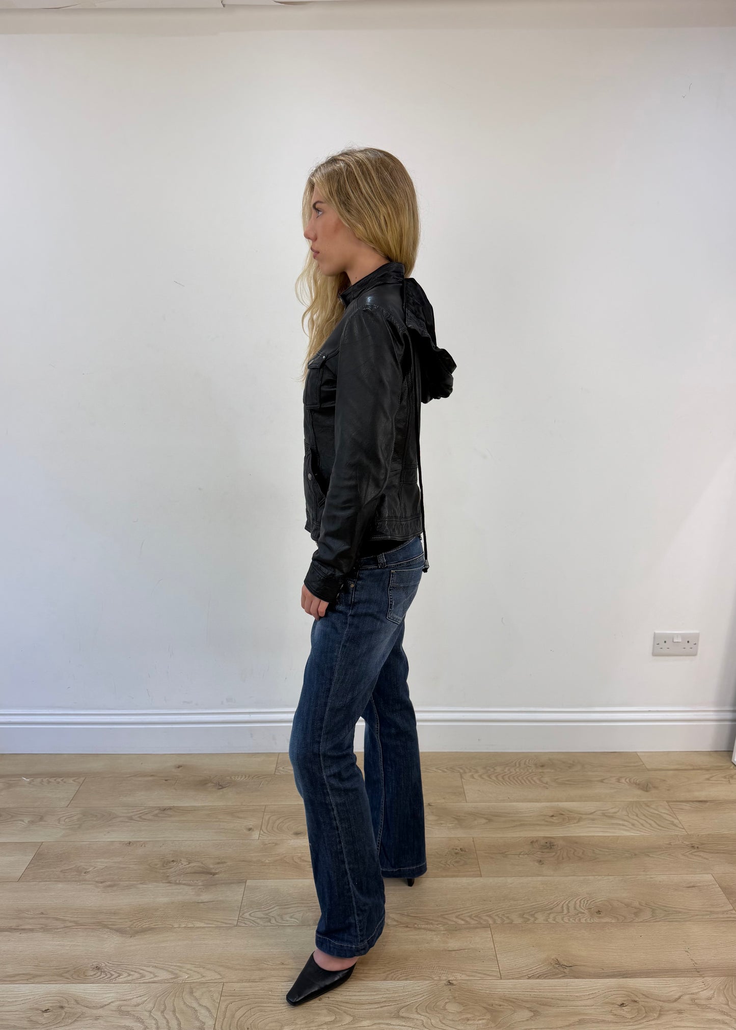 small black faux leather jacket with detachable hood - side view