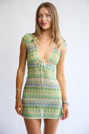 Model wearing the Allegra Dress in Pistachio Green – front view