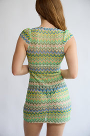 Model wearing the Allegra Dress in Pistachio Green – back view
