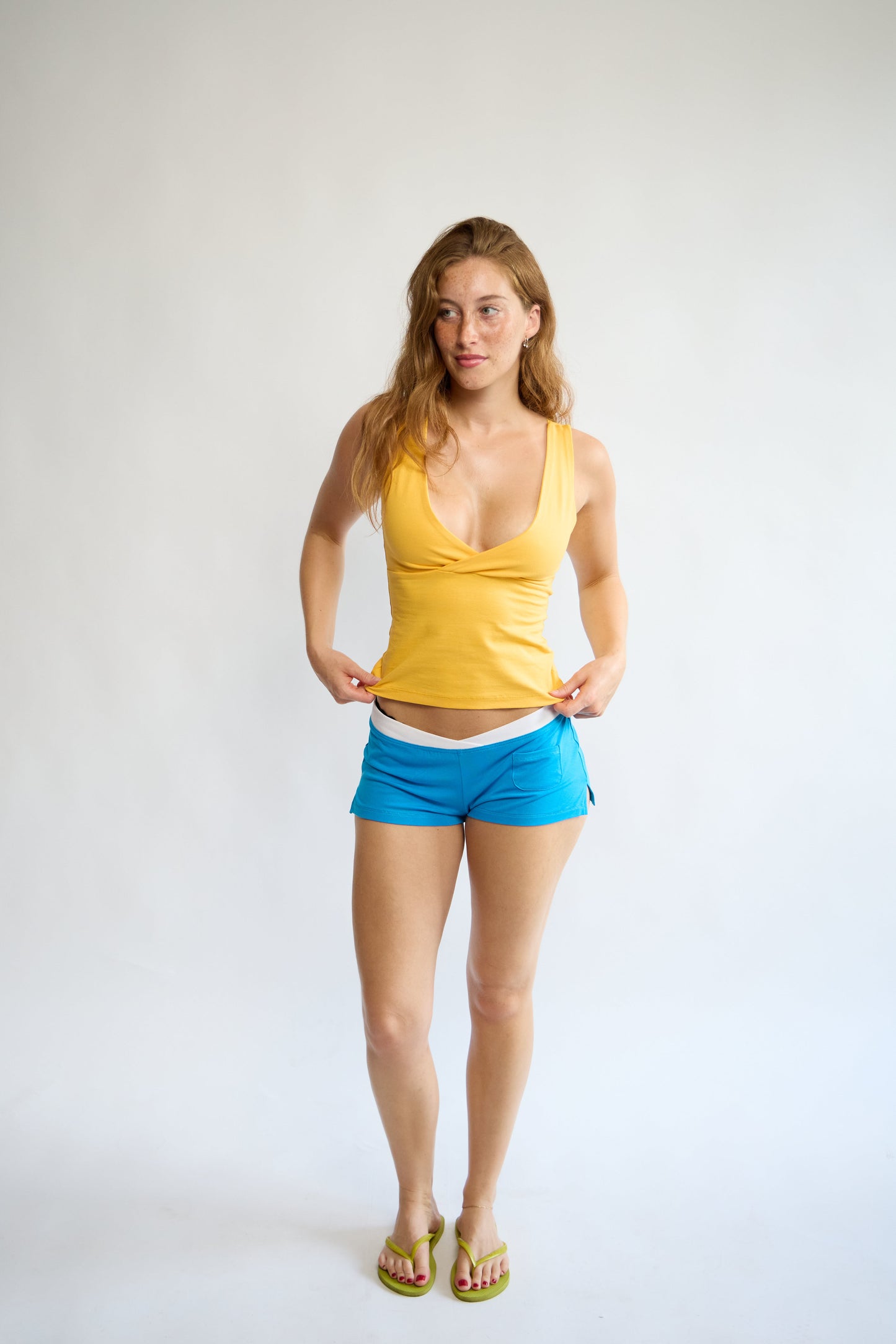 Model wearing the Lorelle Top in Banana Split – full-length front view