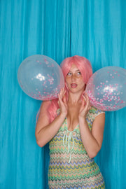 Allegra Dress in Pistachio Green – balloon campaign portrait