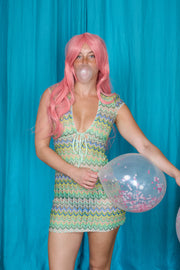 Allegra Dress in Pistachio Green – campaign portrait with pink wig
