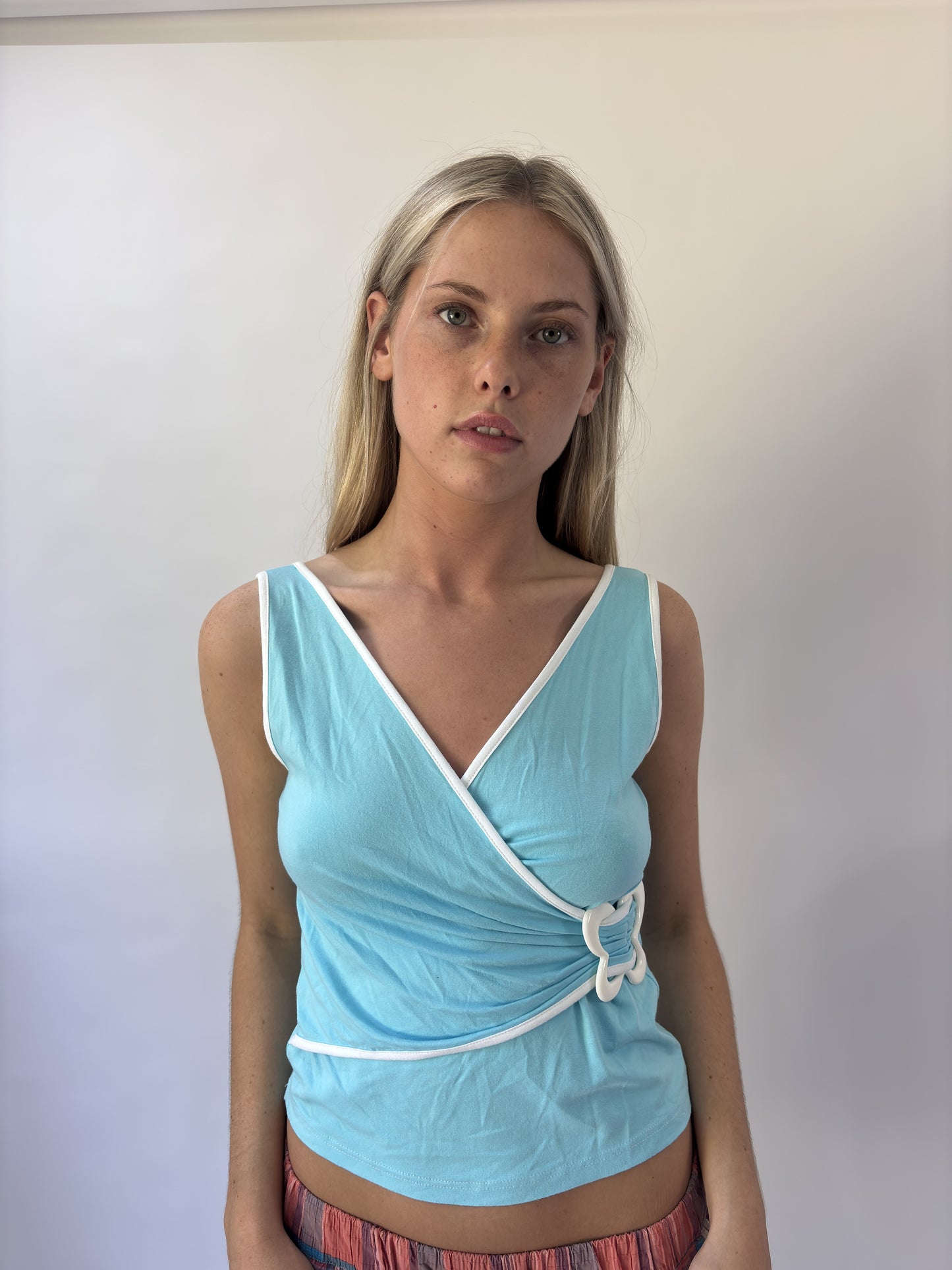 aquamarine drop | small aqua blue butterfly buckle wrap top