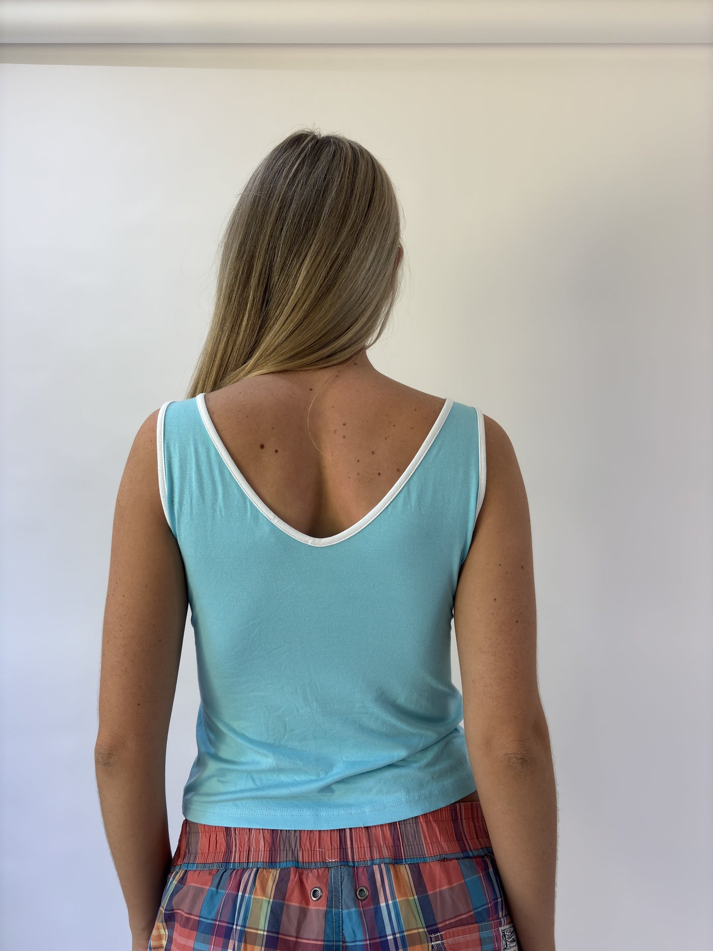 aquamarine drop | small aqua blue butterfly buckle wrap top