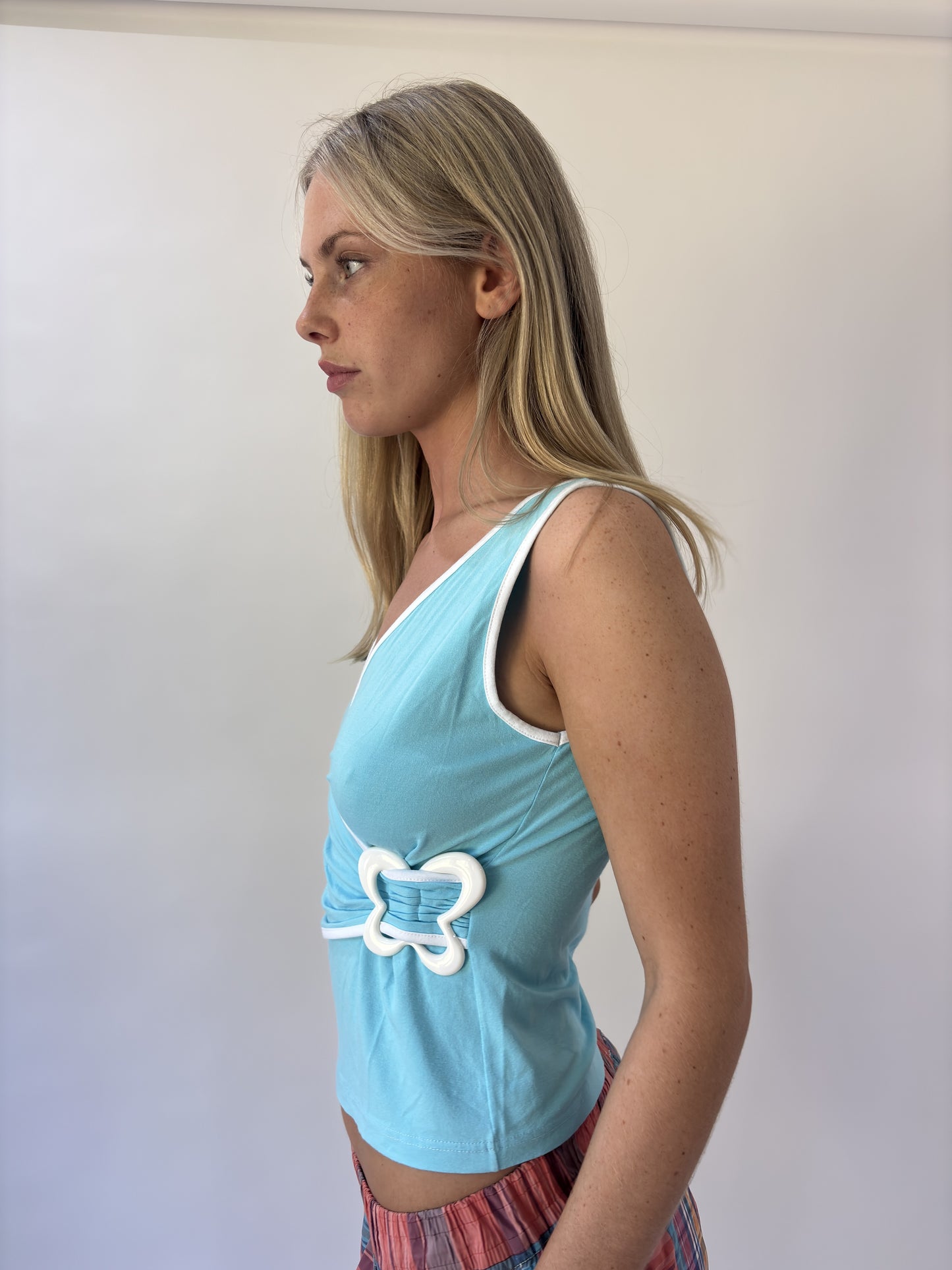 aquamarine drop | small aqua blue butterfly buckle wrap top