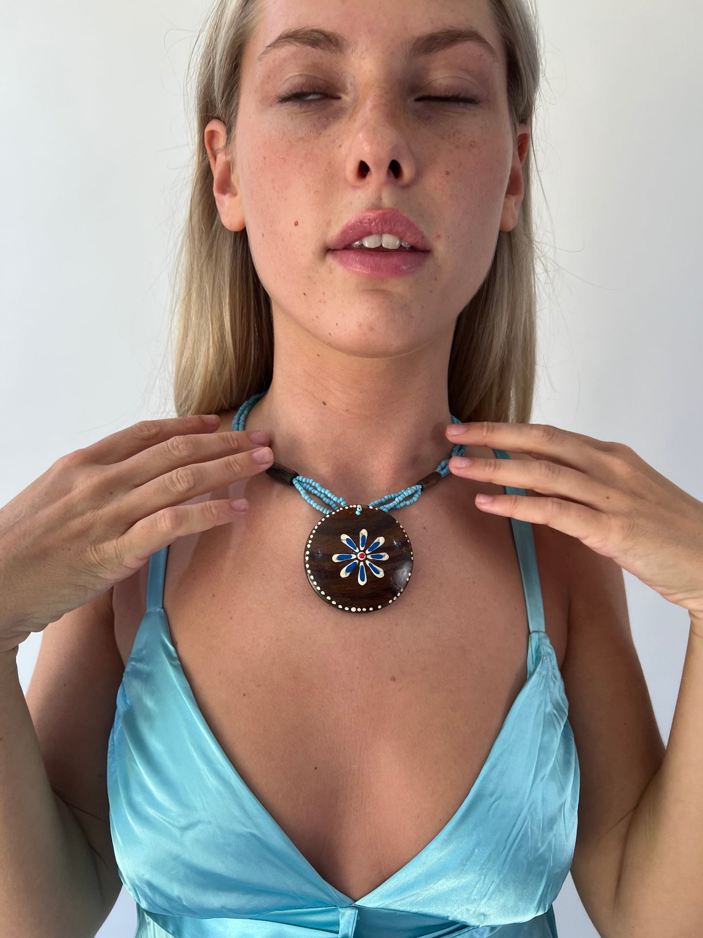 aquamarine drop | one size turquoise beaded wooden flower necklace