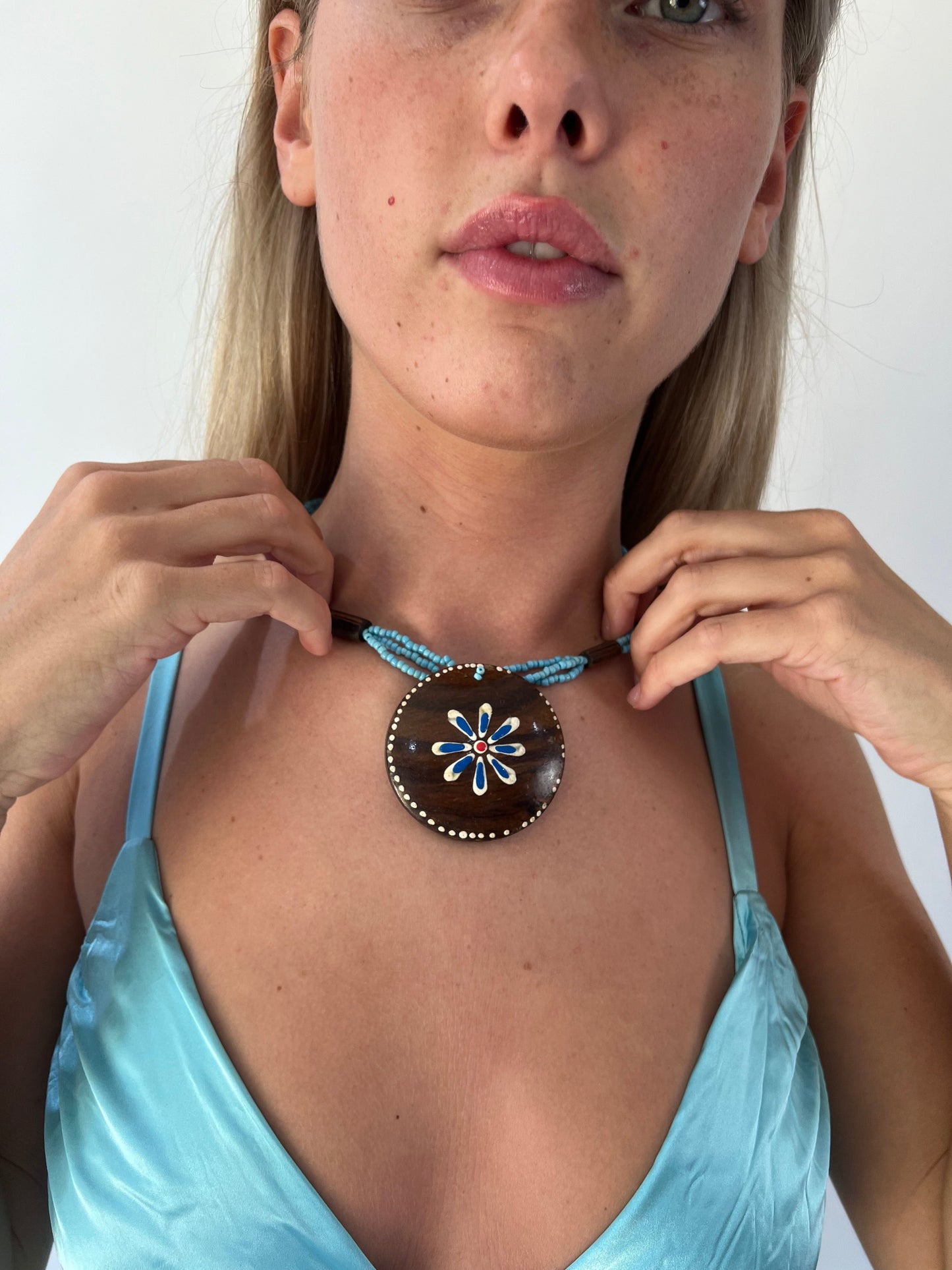 aquamarine drop | one size turquoise beaded wooden flower necklace