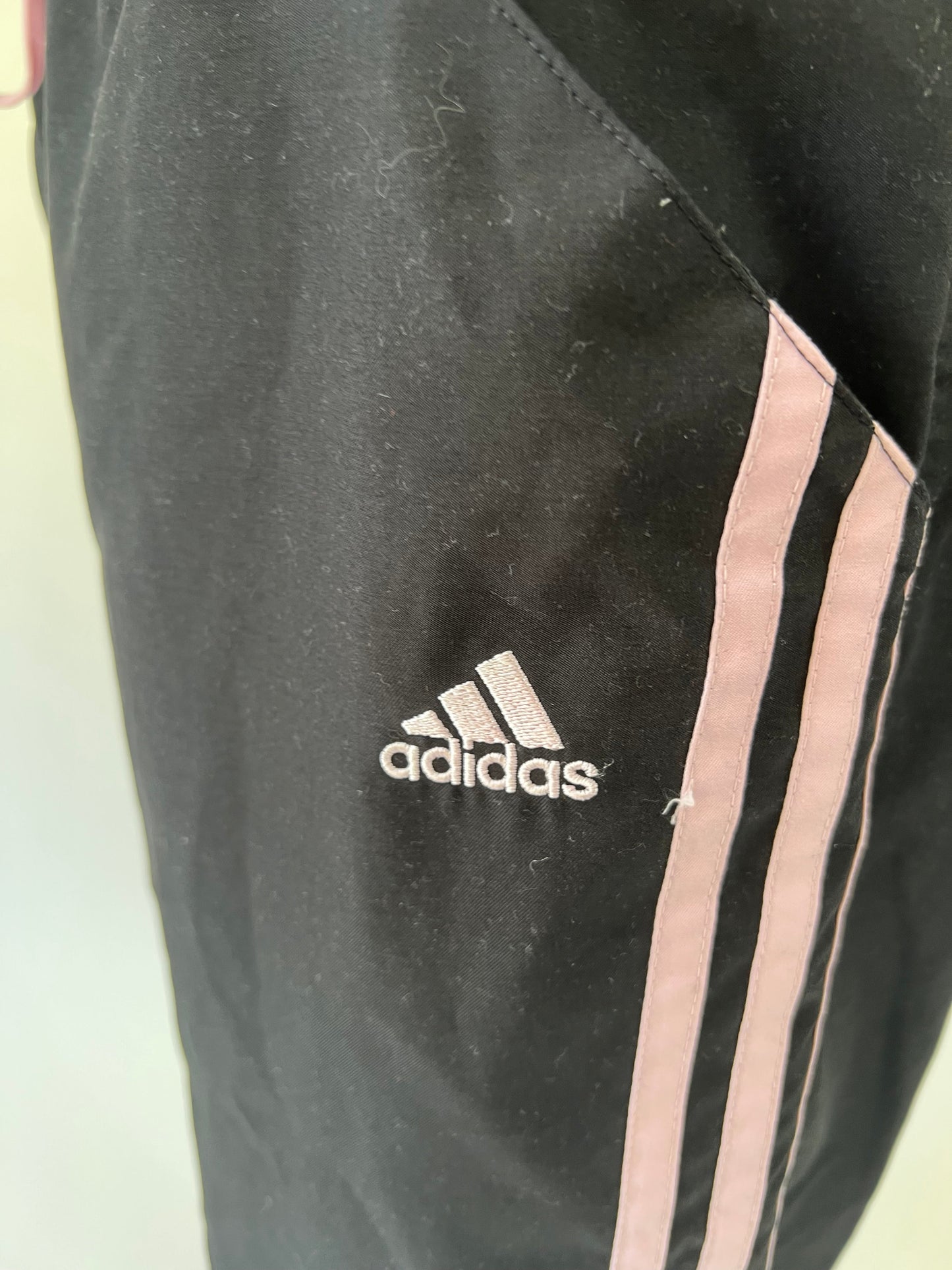 aquamarine drop | small black adidas track pants with pink stripes