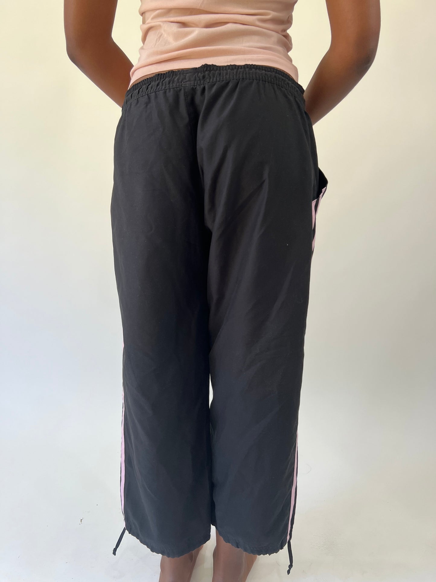 aquamarine drop | small black adidas track pants with pink stripes