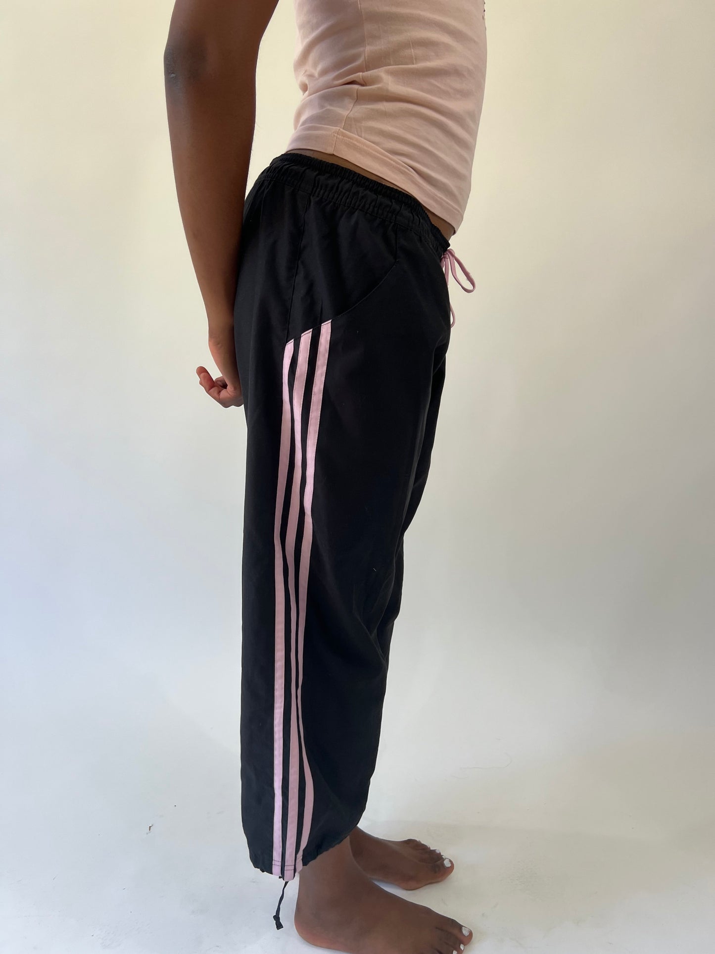 aquamarine drop | small black adidas track pants with pink stripes