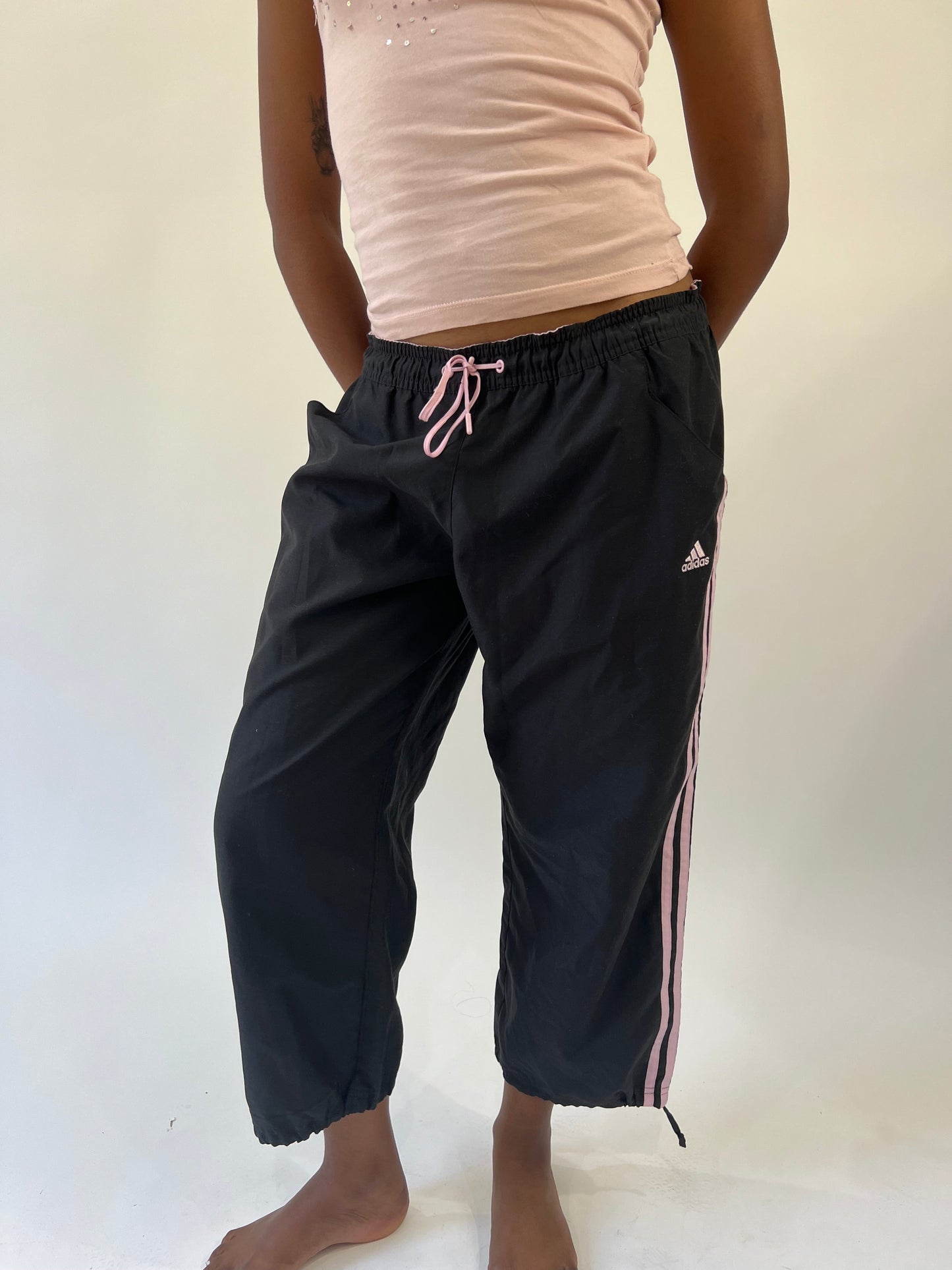 aquamarine drop | small black adidas track pants with pink stripes