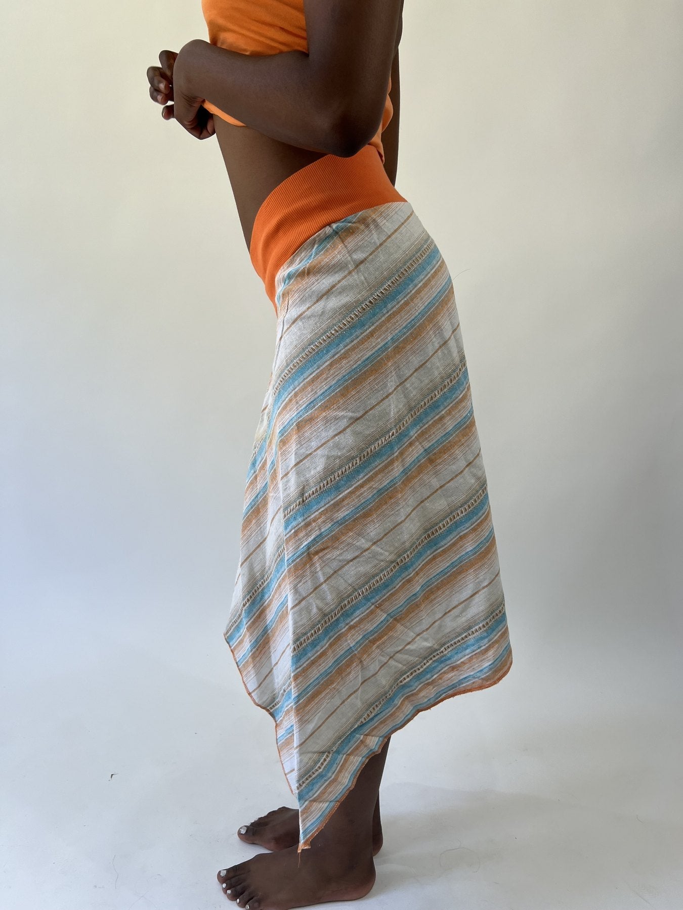 aquamarine drop | small cream blue and orange striped asymmetric midi skirt