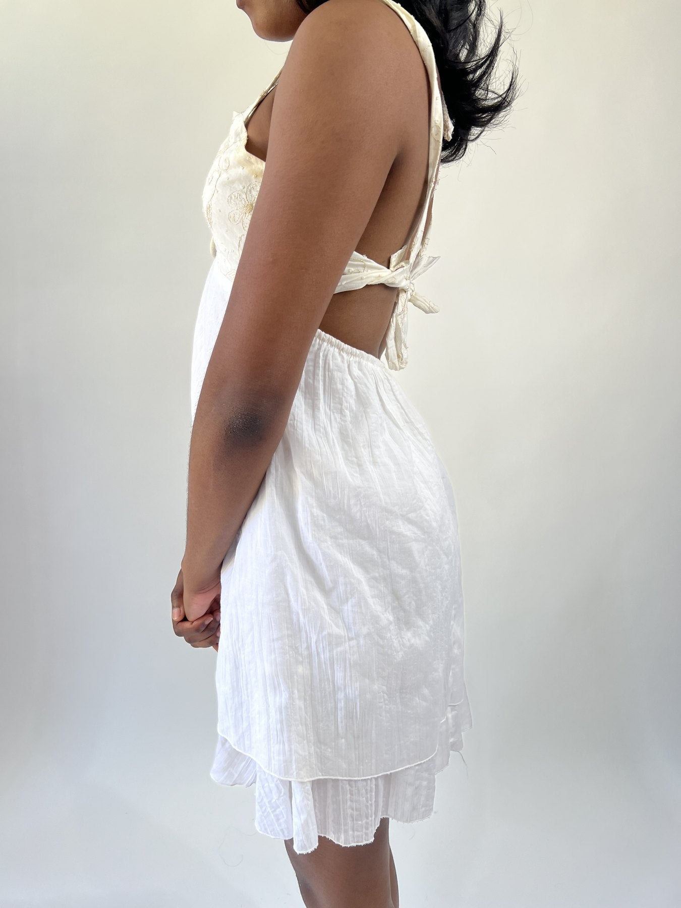 aquamarine drop | small white cutout halter mini dress