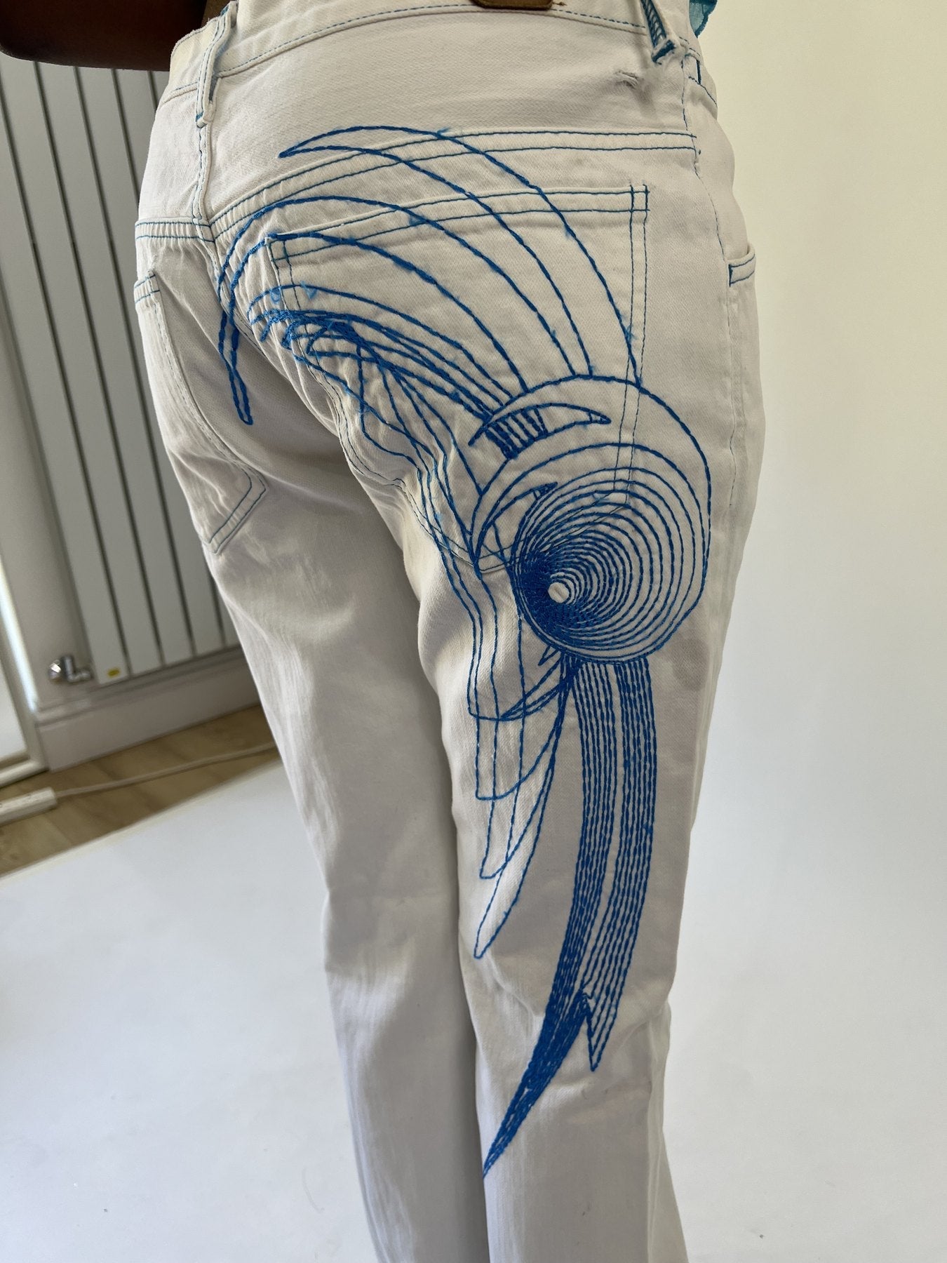 aquamarine drop | small white and blue embroidered flare trousers