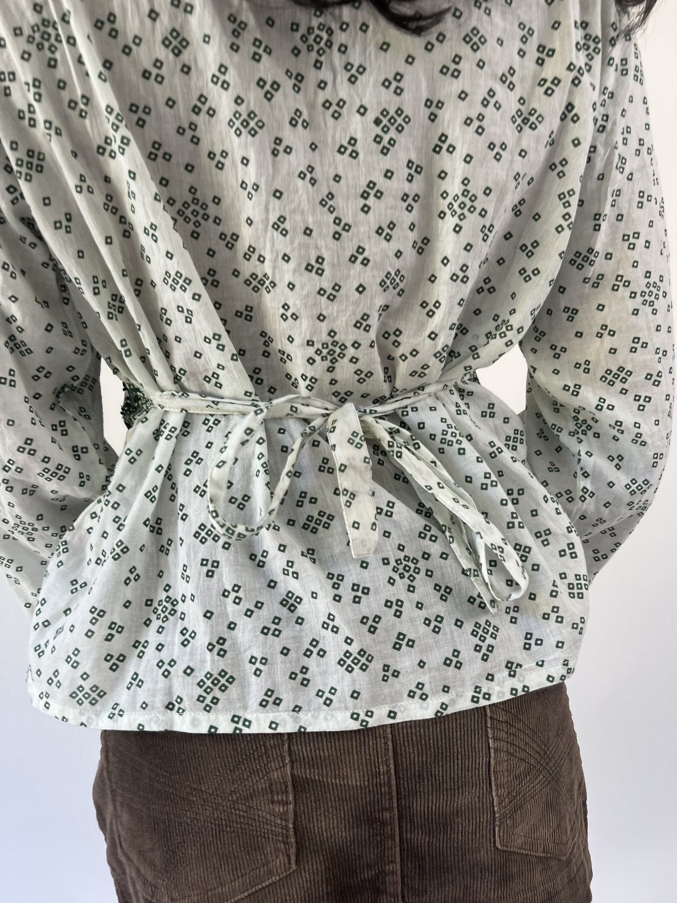 aquamarine drop | small white and green patterned long sleeve top