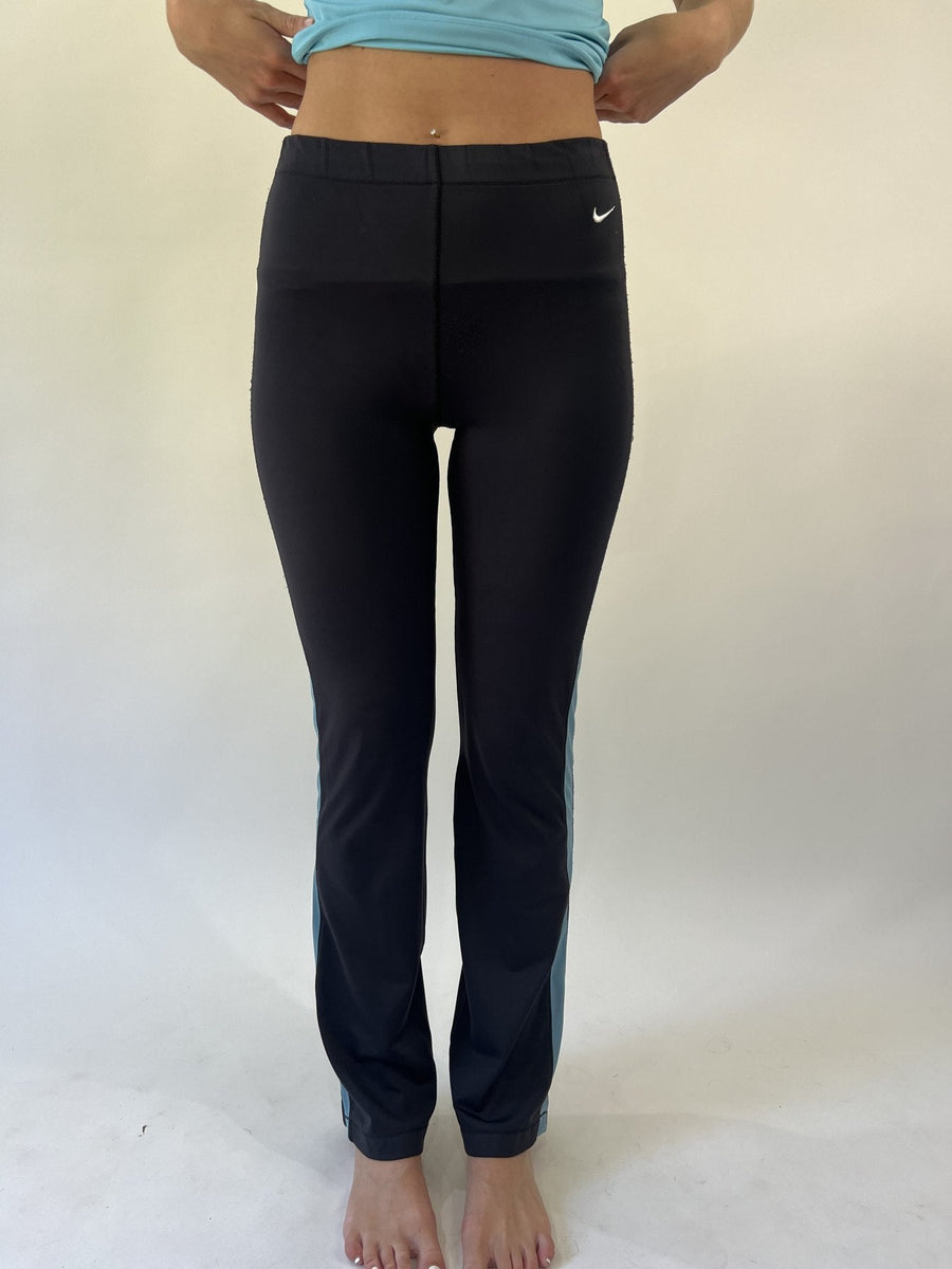 aquamarine drop | small black nike track pants with blue stripe