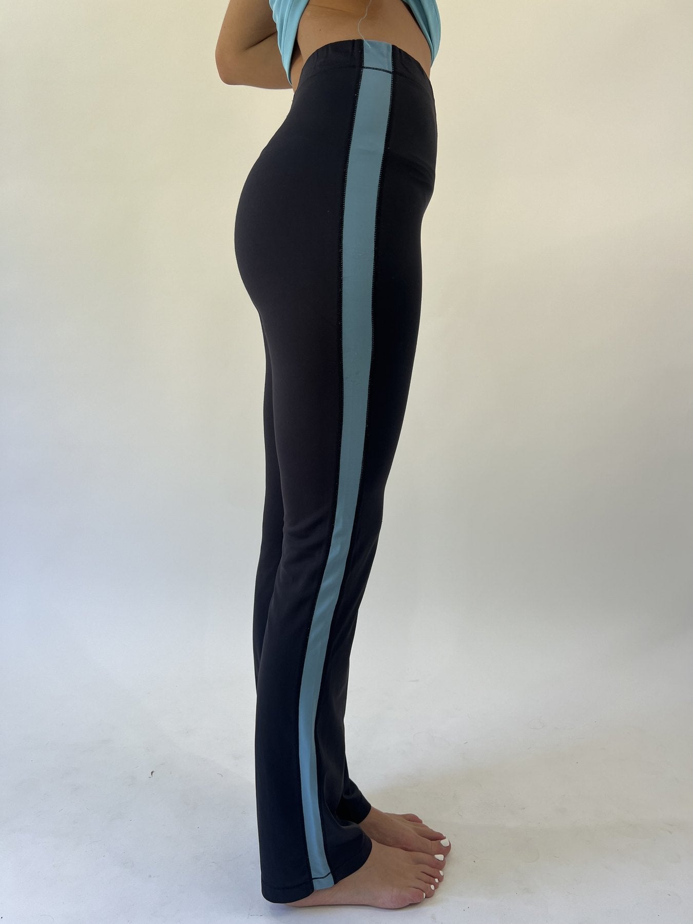 aquamarine drop | small black nike track pants with blue stripe