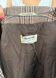 small brown and beige checked coat label