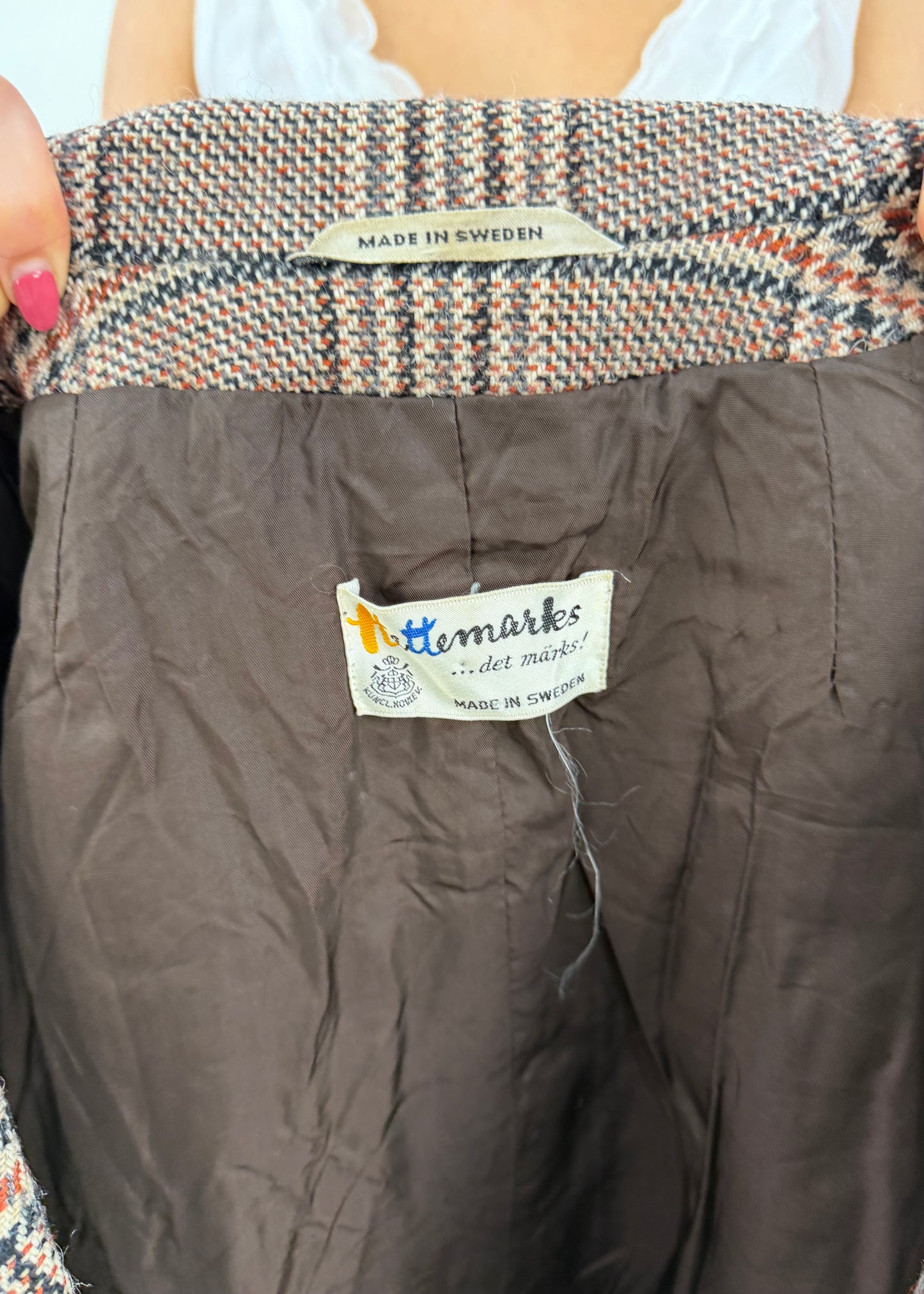 small brown and beige checked coat label