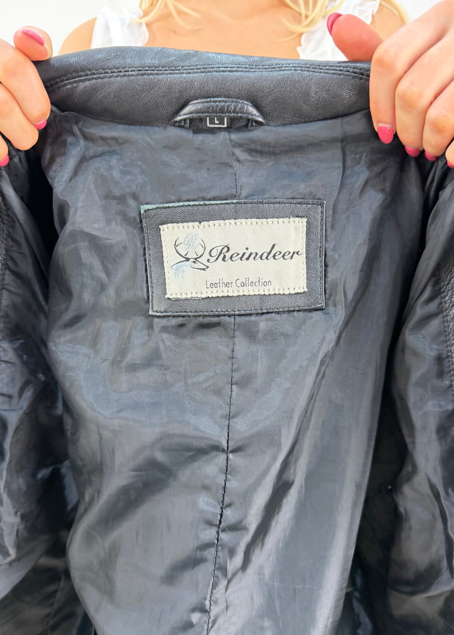 large black leather fitted jacket label