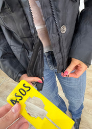 large black buckle utility jacket label