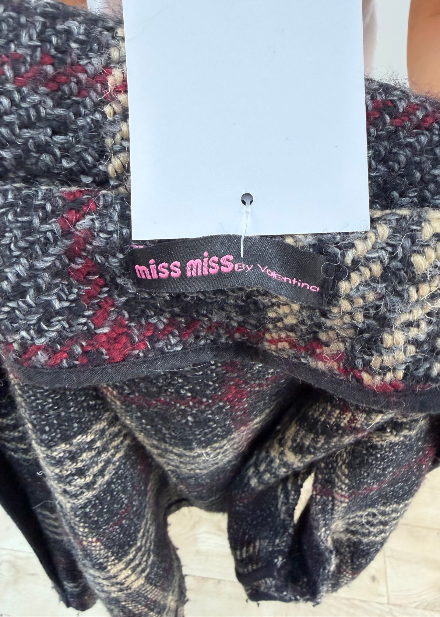 small grey checked peacoat label