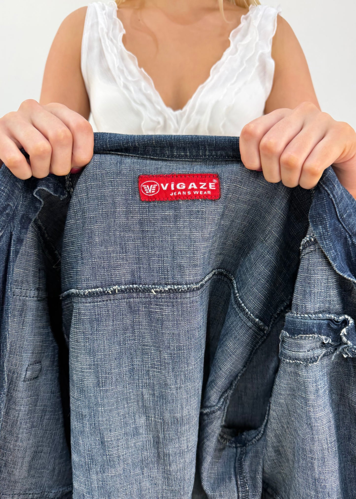 medium blue denim utility jacket label