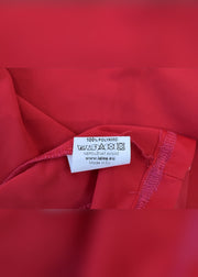 medium red tank top with cut out back detail label