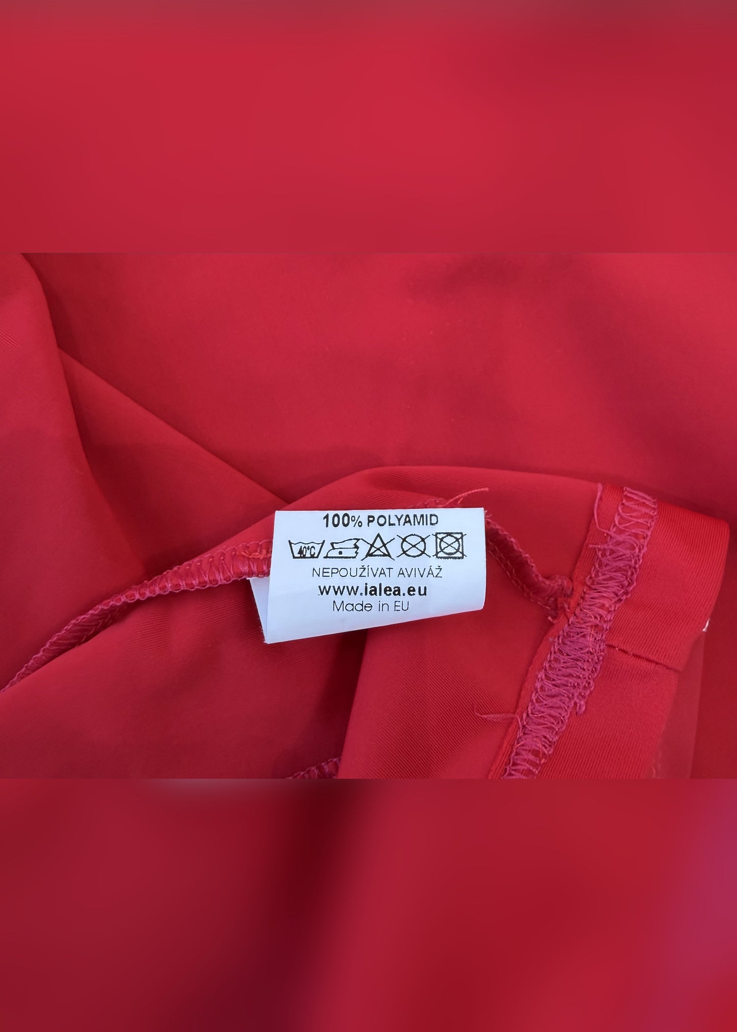 medium red tank top with cut out back detail label