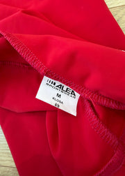 medium red tank top with cut out back detail label