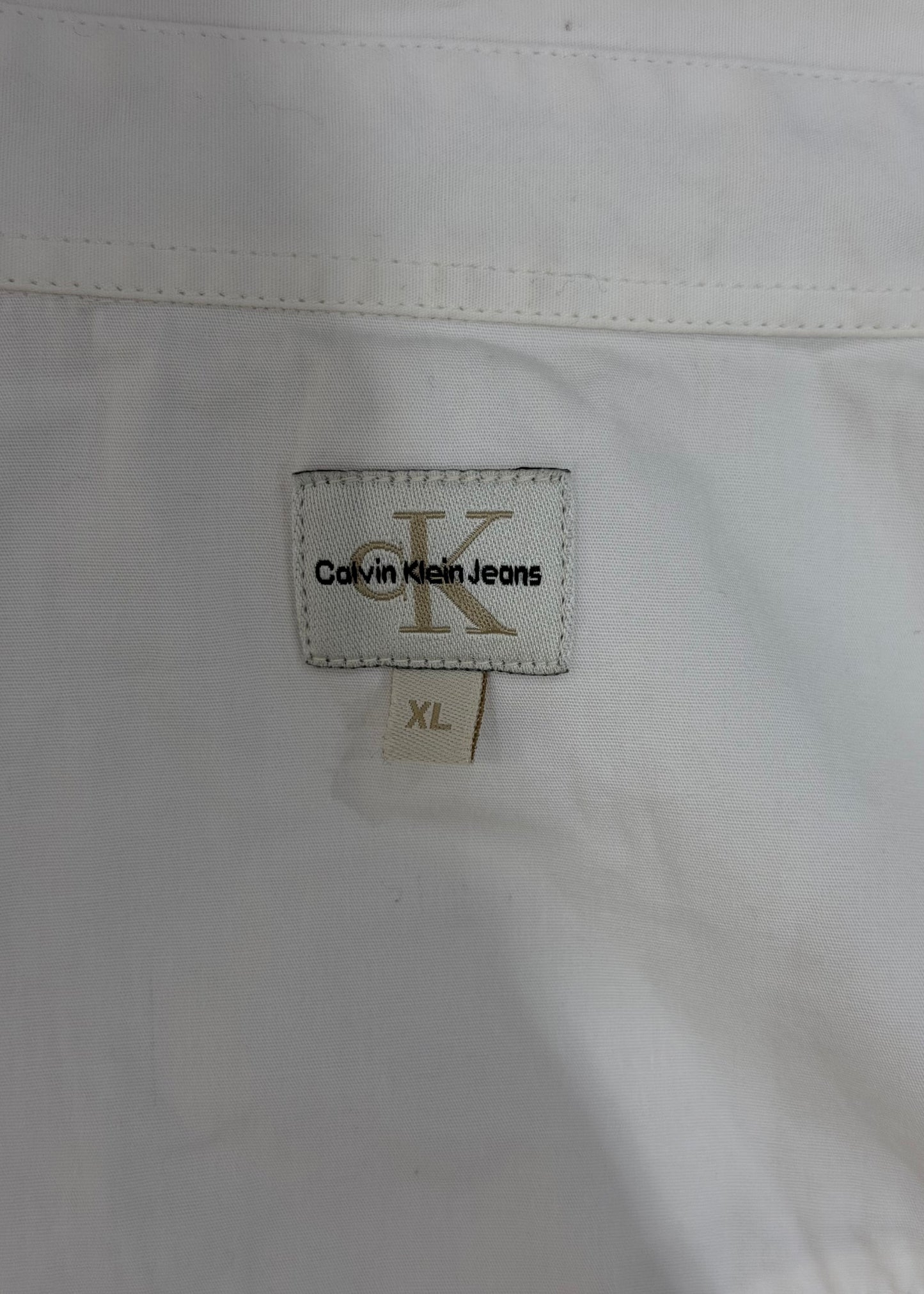 extra large white calvin klein collared long sleeve blouse label or detail