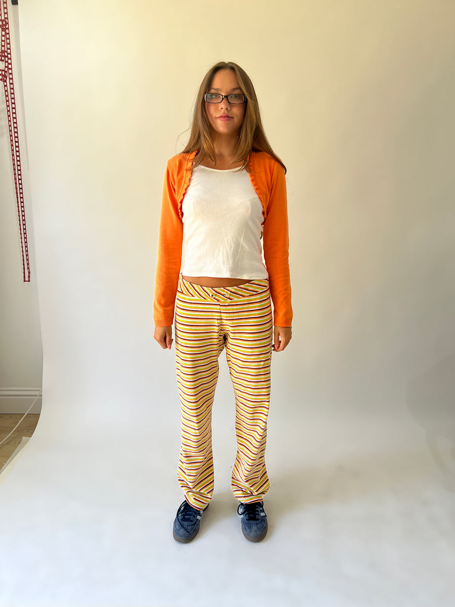 large multicoloured striped flared trousers front view