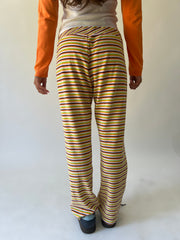 large multicoloured striped flared trousers back view