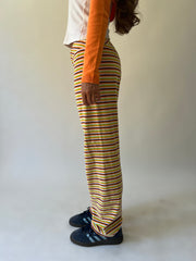 large multicoloured striped flared trousers side view